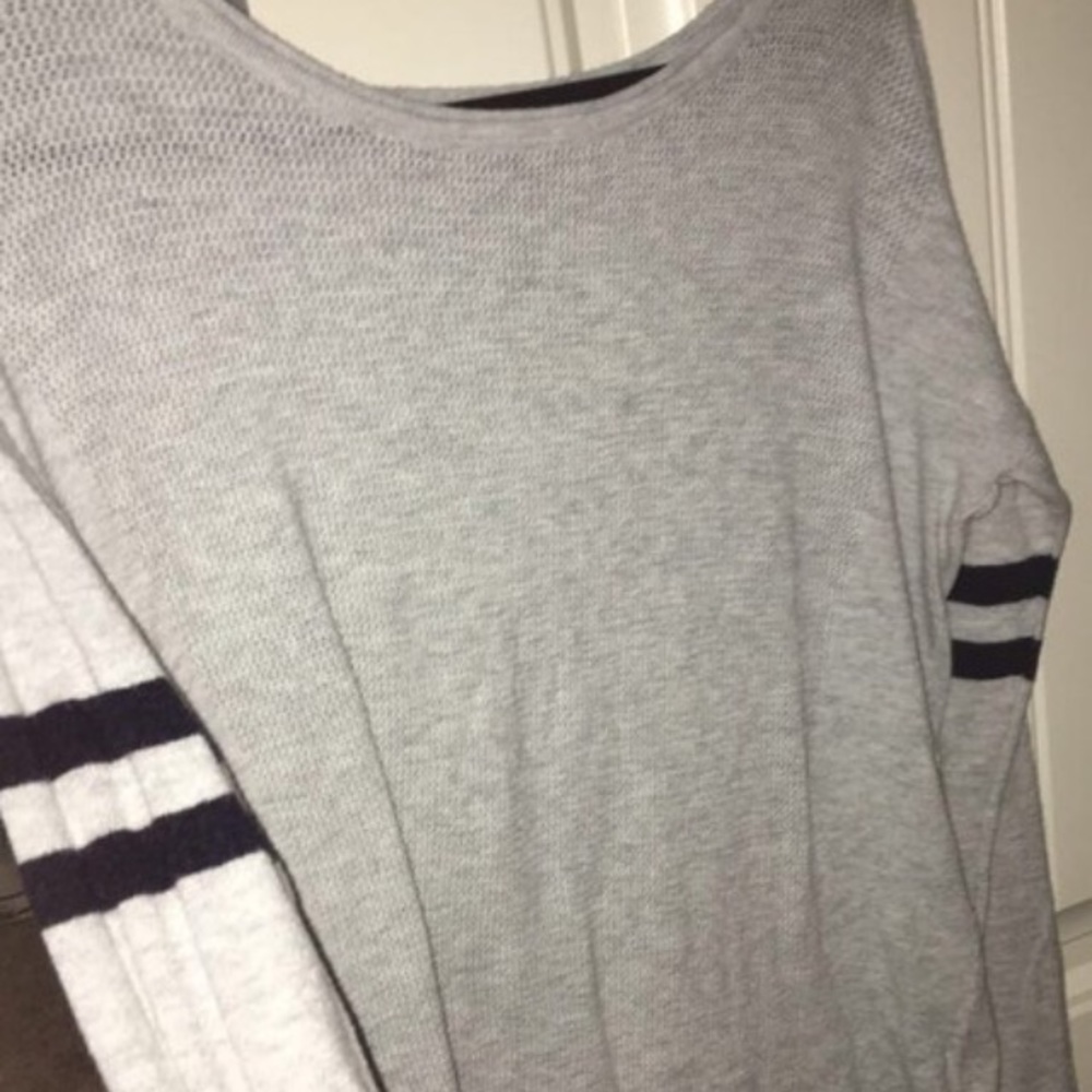 Grey Sweater. Striped arms.